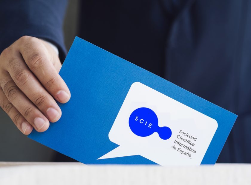 man-placing-box-his-ballot-scie